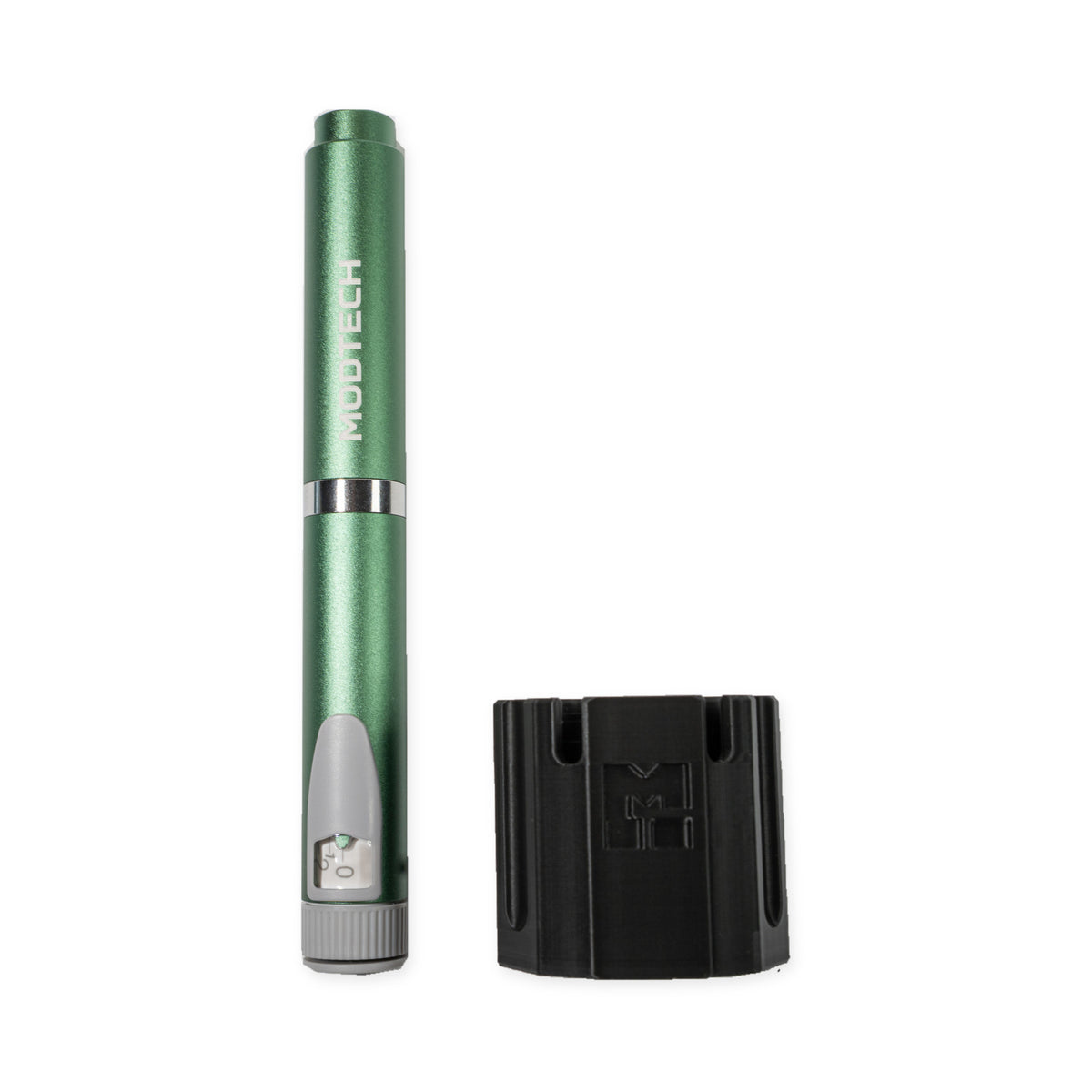 Green MODTECH V2 pen standing beside the black purge station, seen from the side