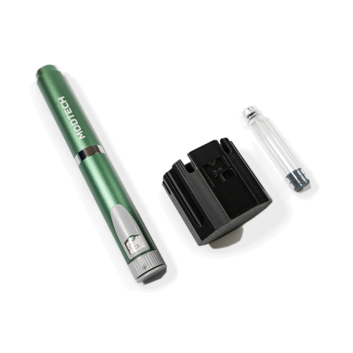 Green MODTECH V2 pen beside the black purge station and one 3 mL glass cartridge