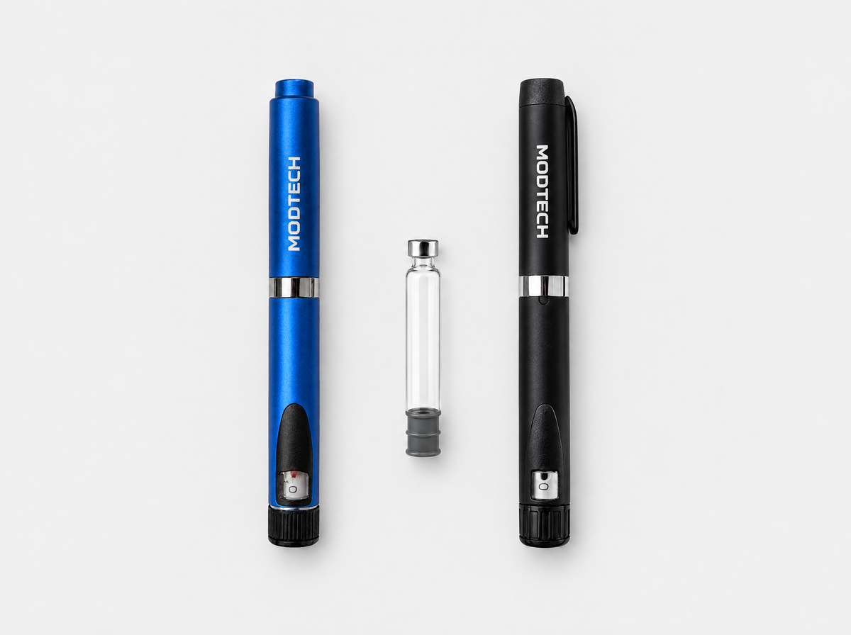 Blue MODTECH V2 pen and black V3 pen with one empty 3 mL glass cartridge between them; the same cartridge fits both